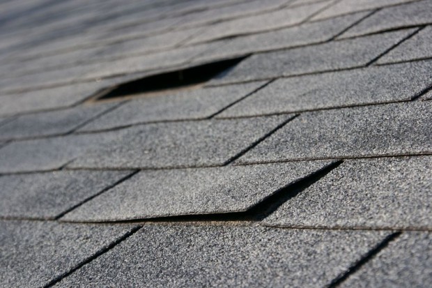 Shingles Recycled into Roads